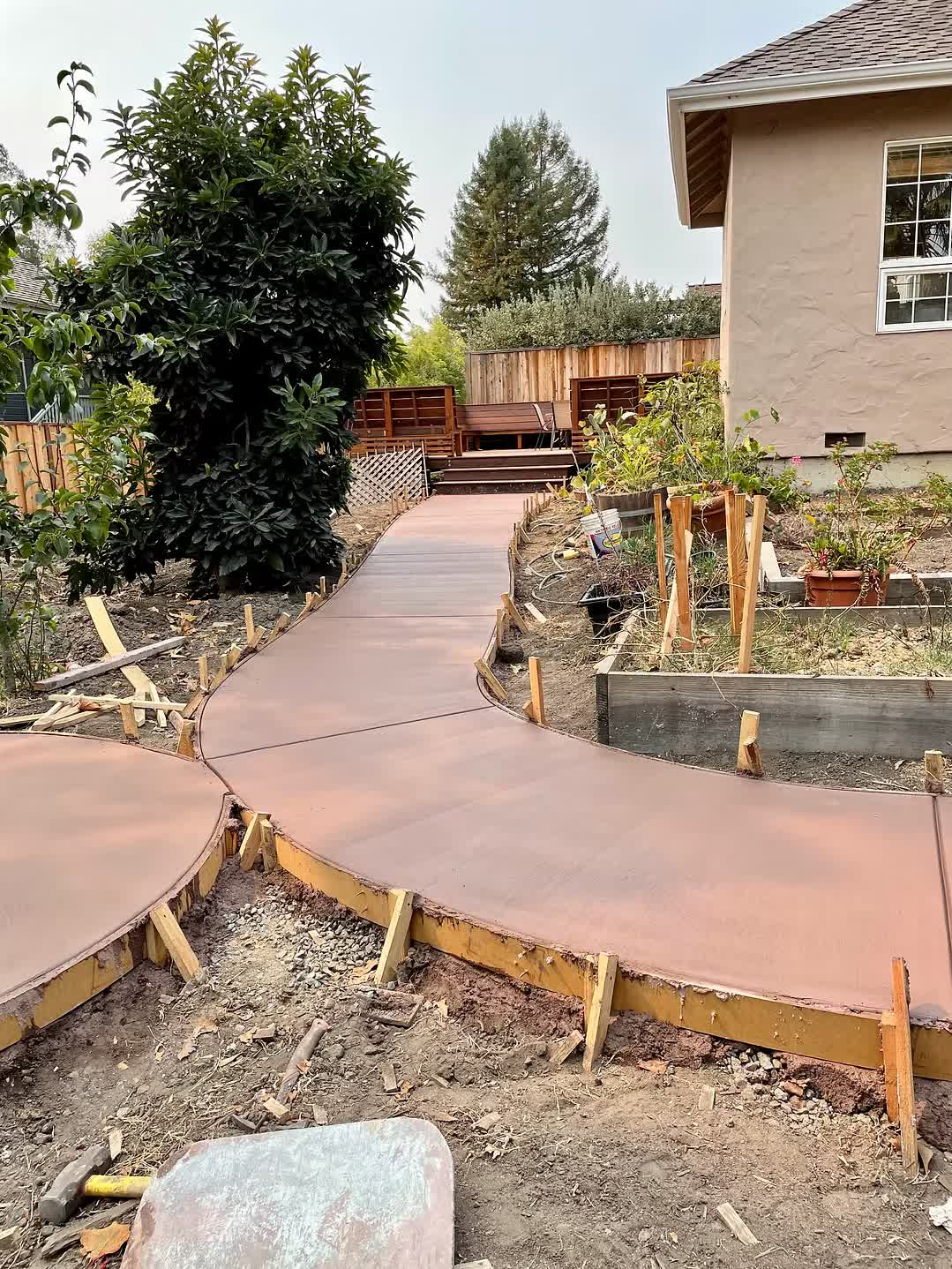 Concrete walkway and patio work by VSG Builder
